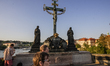 People walking at the Charles bridge are seen on 1 May 2012 in Prague (Praha) Czech Republ...