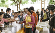 Cambodian migrant workers are fed by the Thai military before they cross the border and re...