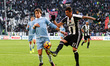 Lazio defender Patric (4) fights for the ball against Juventus forward Mario Mandzukic (17...