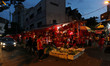 Chinese lantern vendor at a market stall in Jakarta, Indonesia on January 22, 2017.  Indon...