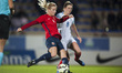 Gunhild Herregarden (Norway) vies Jade Moore (England) during the preseason friendly match...