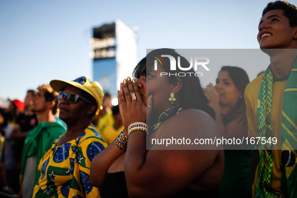 (140704) -- BRASILIA, July 4, 2014 () -- A Brazil's fan reacts while watching a televised quarter-finals match between Brazil and Colombia o...
