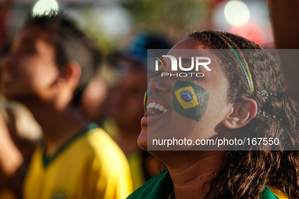 (140704) -- BRASILIA, July 4, 2014 () -- A Brazil's fan reacts while watching a televised quarter-finals match between Brazil and Colombia o...