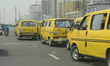 Commercial Yellow Buses, popularly known as Danfo, on top of bridge at Marina, Lagos, Nige...