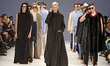 Models present creations by Ukrainian designer Nikita Melenevskiy during the Ukrainian Fas...