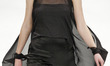 A model presents a creation by Ukrainian designer Ivan Fotesko during the Ukrainian Fashio...