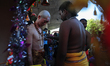 A man hindu devotee perform their religious rite before making their way to the Batu Cave...