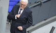 New elected German President Frank-Walter Steinmeier (C) arrives to hold a speach to the m...