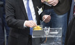 German Interior Minister Thomas De Maiziere casts his ballot during the Presidential elect...