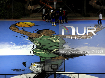Graffiti of Greek NBA player Giannis Antetokounmpo in Athens, Greece, February 17, 2017. Nike in collaboration with graffiti artist Same84 c... by Giorgos Georgiou/NurPhoto