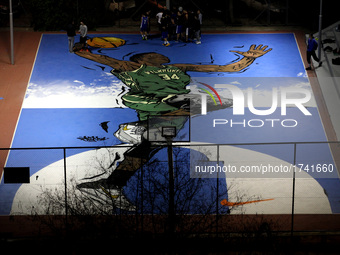 Graffiti of Greek NBA player Giannis Antetokounmpo in Athens, Greece, February 17, 2017. Nike in collaboration with graffiti artist Same84 c... by Giorgos Georgiou/NurPhoto
