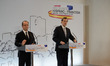 Spanish Prime Minister Mariano Rajoy (R) and French President Francois Hollande give a joi...
