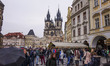 Tourists walking in Old Town Square of Prague, the capital city of Czech Republic during t...