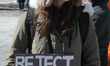 Pro-Muslim protestor carrying a sign saying 'Reject Fear' as opposing groups of protesters...