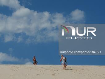 Leba, Poland 20th, July 2014 Moving sand dunes in the Slowinski National Park between Leba and Rowy in Northern Poland at the Baltic sea coa... by Michal Fludra/NurPhoto