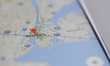 The Google Maps app is seen displaying part of the Manhatten district of New York City on...