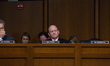 U.S. Senator Chris Coons (DE), listens, as President Trump's Supreme Court nominee, Judge...