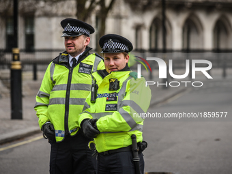 Police officers in London, on March 23, 2017. Police continue investigations after the terror attack in London yesterday in which a car was...