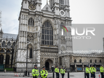 Police officers in front of Westminster Abbey in London, on March 23, 2017. Police continue investigations after the terror attack in London...