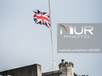 A Union Jack flag flies at halfmast in London, on March 23, 2017. Police continue investigations after the terror attack in London yesterday...