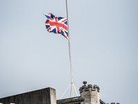 A Union Jack flag flies at halfmast in London, on March 23, 2017. Police continue investigations after the terror attack in London yesterday...