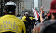 As marchers head towards City Hall on Market Street Police Bike Patrol Unit lines both sid...