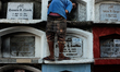 A man sniffing illegal drugs inside a tomb  in Carreta Cemetery on 27 March 2017. The Carr...