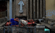 At 9:00 am a lot of people inside the cemetery are still seen sleeping above the tomb in C...