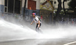 Opposers to Nicolas Maduro's government clash with security forces during a demonstration...