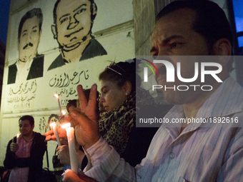 Demonstrated in Cairo, Egypt on 10 April 2017 by candles in front of the Journalists Syndicate to solidarity with the victims of the bombing...