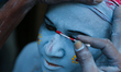 A Hindu man is painted as he takes part in a festival called Lal Kach in Dhaka, Bangladesh...