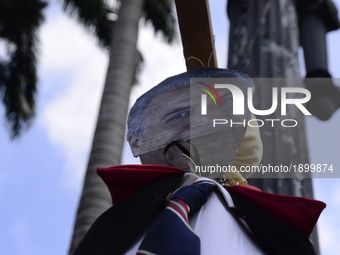 A puppet of Brazilian President Michel Temeris hanged up by a group of protesters at in Sao Paulo, Brazil on April 15, 2017. (