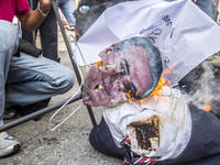 A puppet of Brazilian President Michel Temer was set on fire by a group of protesters  in Sao Paulo, Brazil on April 15, 2017. (