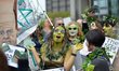 "Swamp-people" protest Republican Sen. Pat Toomey at a Tax Day protest in Center City Phil...