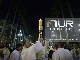 Penitents celebrates Easter Saturday at the Metropolitan Cathedral, in Sao Paulo, Brazil, on April 15, 2017. (