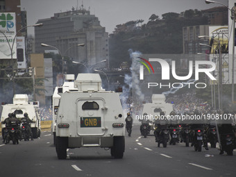 Riot police during a march against Venezuelan President Nicolas Maduro, in Caracas on April 19, 2017. Venezuelans took to the streets Wednes...