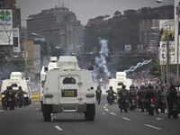 Riot police during a march against Venezuelan President Nicolas Maduro, in Caracas on April 19, 2017. Venezuelans took to the streets Wednes...