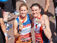 Helen Glover (L) and Heather Stanning pose for a photo after completing the Virgin London Marathon on April 23, 2017 in London, England.  (