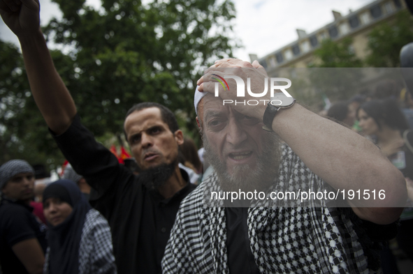 Pro-Palestinian protesters gather at Place de La Republique during a banned demonstration in support of Gaza, in Paris, France, Saturday, Ju...