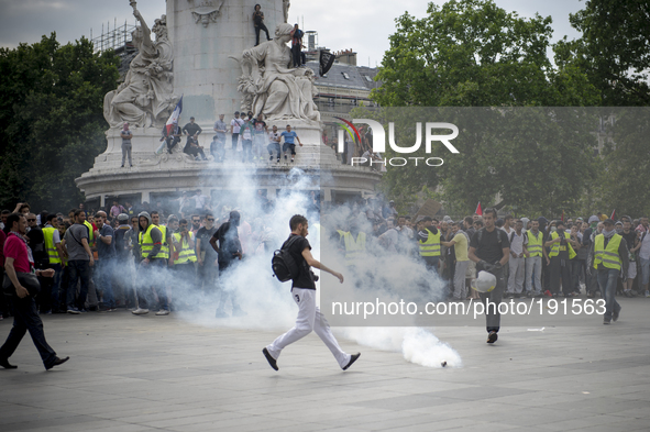 Pro-Palestinian protesters during clashes at Place de La Republique, during a banned demonstration in support of Gaza, in Paris, France, Sat...