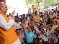 National President of Bharatiya Janata Party (BJP), Amit Shah meets  party workes in slum area at Chetla in Bhabanipur in  Chief Minister Ma...
