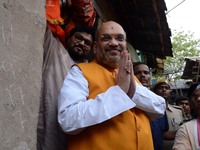 National President of Bharatiya Janata Party (BJP), Amit Shah visits   party worker's home in slum area at Chetla in Bhabanipur in  Chief Mi...