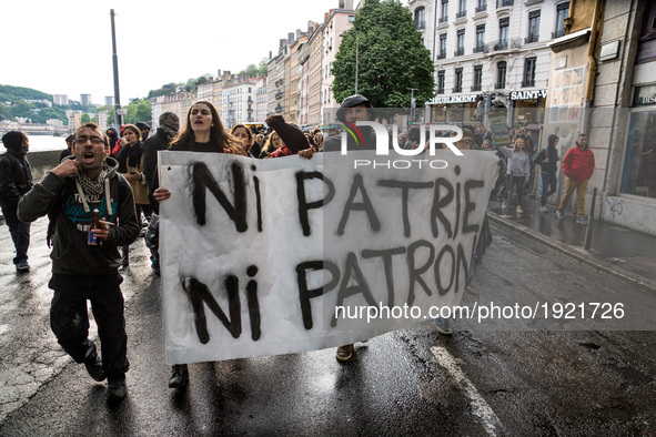 Students hold a protest banner during a demonstration against the results of the first round of the French presidential election on April 27...