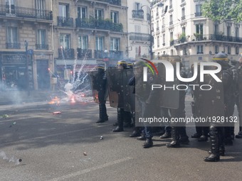 Demonstrators confront police on the annual May Day worker's march on May 1, 2017 in Paris, France. Police dealt with violent scenes in cent...