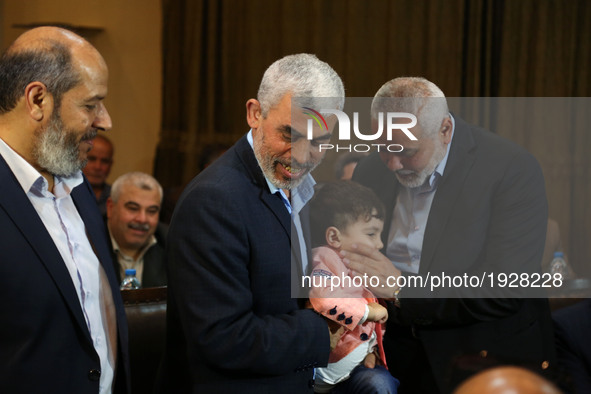 Hamas leader Ismail Haniyeh (R) and Hamas Gaza Chief Yehya Al-Sinwar attend a ceremony announcing a new policy document, in Gaza City May 1,...