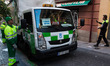 Street cleaners work with a police escort while completing minimum services as agreed by t...