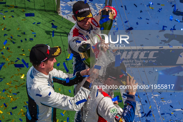 The winner Mehdi Bennani, 2nd Nicky Catsburg and 3rd Tom Chilton celebrating on the podium after the main race on the Hungarian WTCC Grand P...