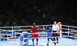 Mike Sekabembe for Uganda fights Haruna Osumanu for Ghana at Boxing in the SECC as part of...