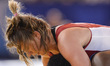 Erica Wiebe for Canada competes against Blessing Onyebuchi for Nigeria at Wrestling as par...