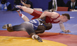 Tommy Hawthorn for Wales competes against Melvin Bibo for Nigeria at Wrestling as part of...